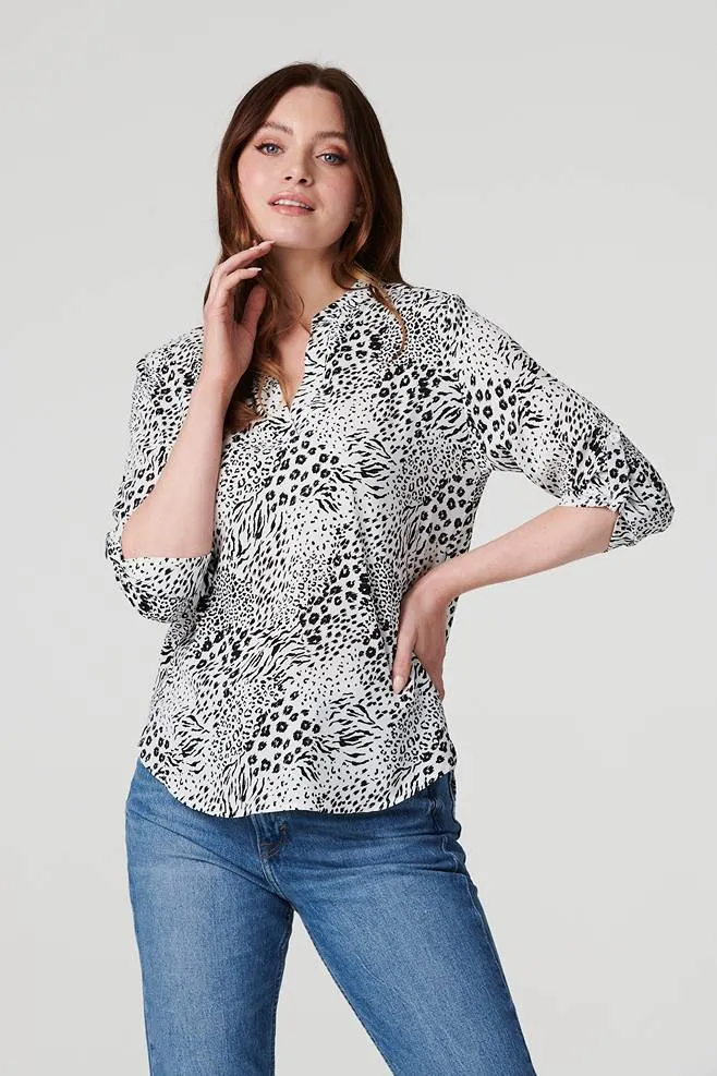 Animal Print Curve Hem Blouse